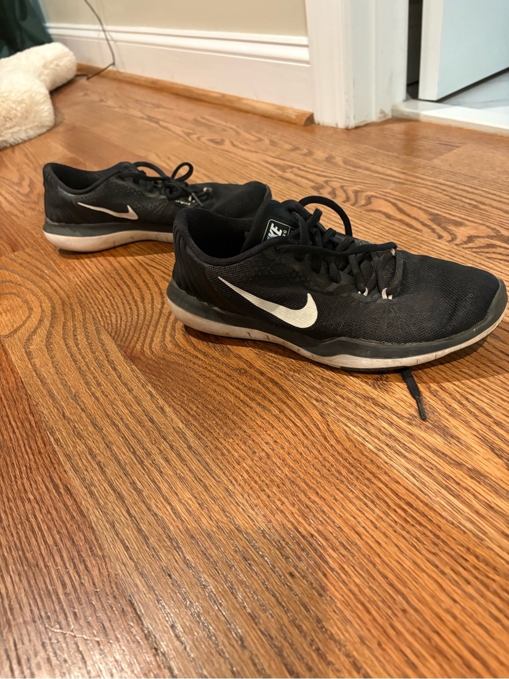 Nike Women’s Black Athletic Shoes with White Swoosh